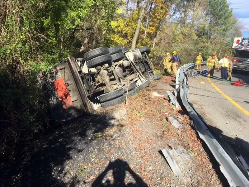 Dump truck overturns on I-64 ramp