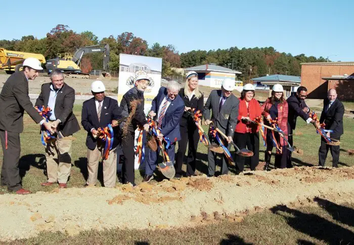 Officials break ground for new Tucker, H. Springs high schools