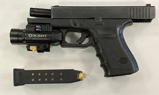 Hampton man caught bringing gun to RIC checkpoint