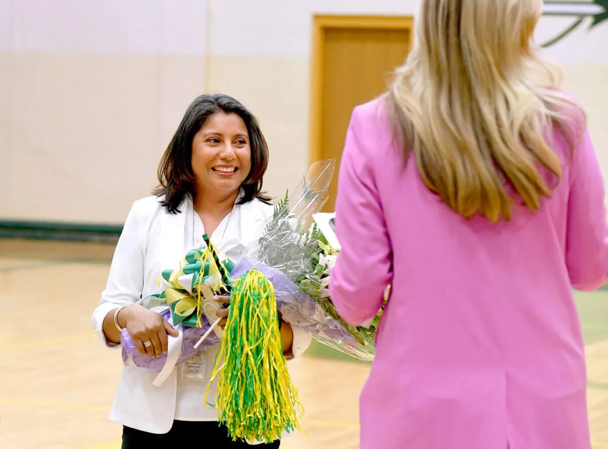 Henrico HS principal honored with REB Leadership Award