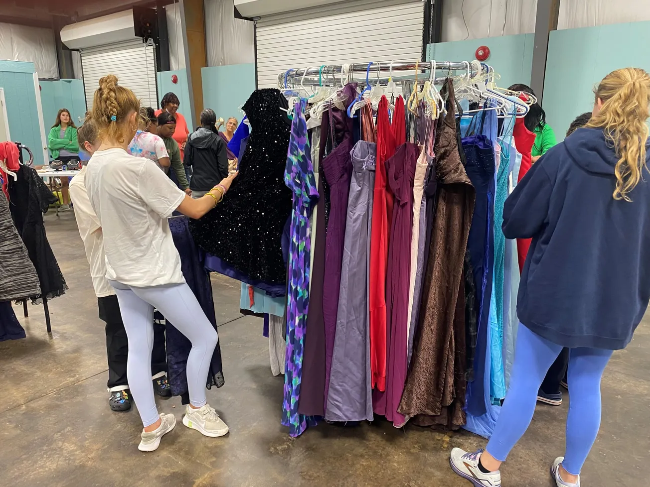 Collegiate students donate ‘Fairy Godmother’ prom dresses